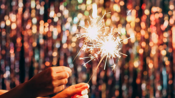 Christmas sparklers winter holidays festive hands