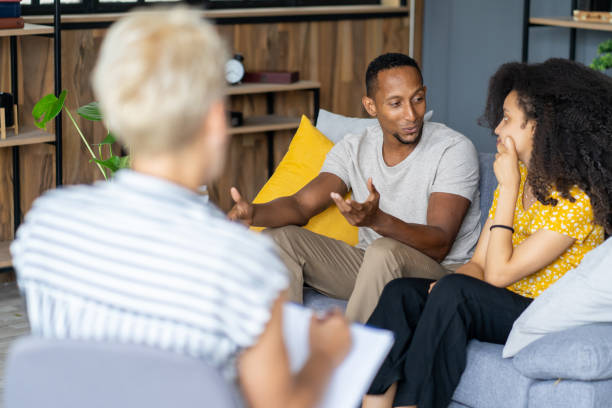 istock Couple talking to counsellor about relationship difficulties 2161928079