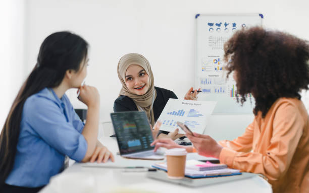 istock Diverse business team actively collaborating and discussing ideas during an office meeting. 2161929661