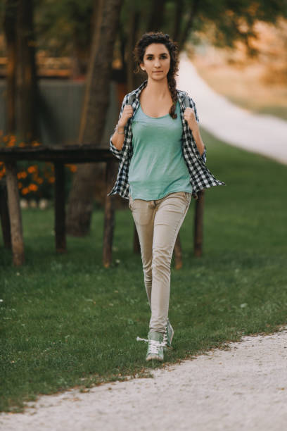 istock Woman walking, calm relaxed in nature 2161930722
