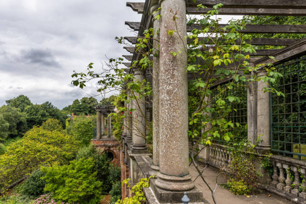 A glimpse of the manicured gardens to be seen at Tatton Park Estate near Knutsford in Cheshire.This is the view from the windows of the neo classical Mansion .There are 50 acres of gardens to explore and no less than a thousand acres of wild deer park to enjoy.The estate is looked after by the National Trust.