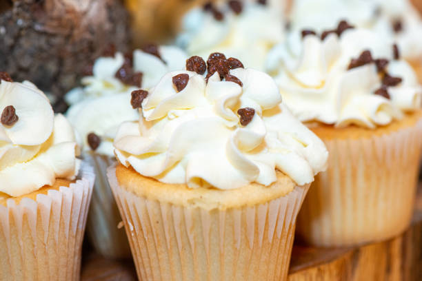 Delicious Vanilla cupcakes with vanilla icing and chocolate chips