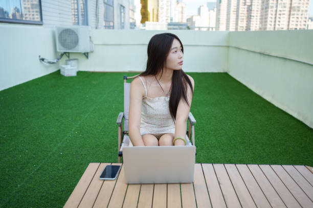 istock Asian girl browsing the Internet 2161943279