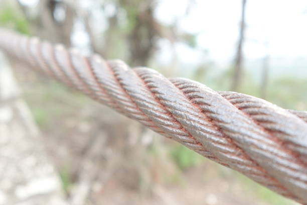 Rustic metal rope weathered by nature’s elements