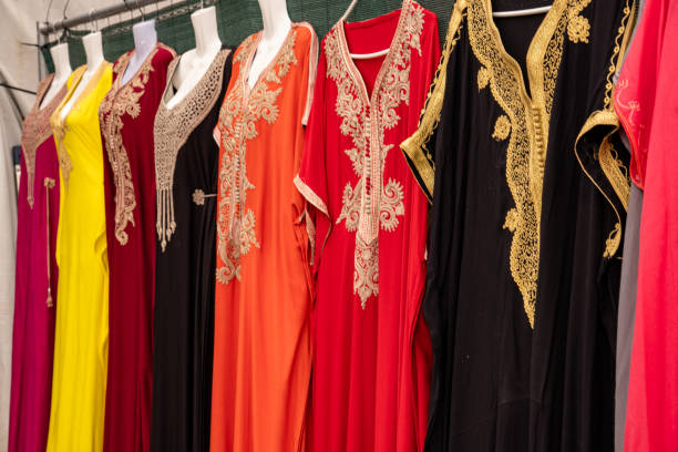 istock Colorful, richly embroidered Arabic kaftans at a market 2161946459