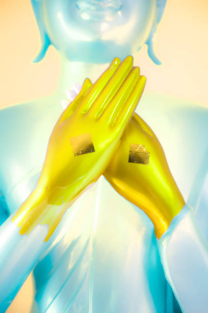 Hands of a golden Buddha statue in Thailand. Golden Buddha hand. Two hand of buddha statue.