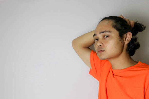 expression of a handsome Indonesian man with isolated white background