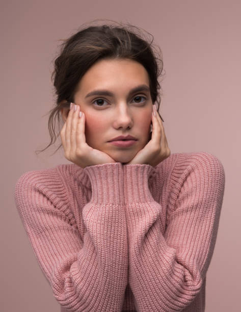 istock Beautiful sensual girl wearing sweater 2161961404