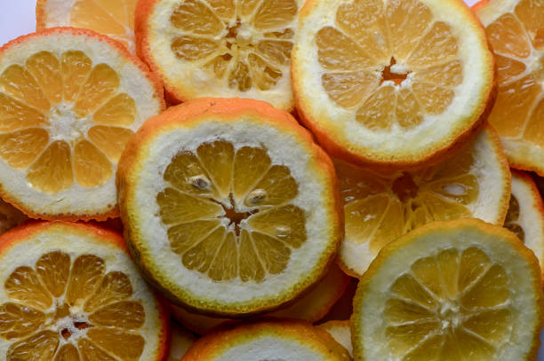 istock juicy oranges cut into circles as a background 5 2161969108
