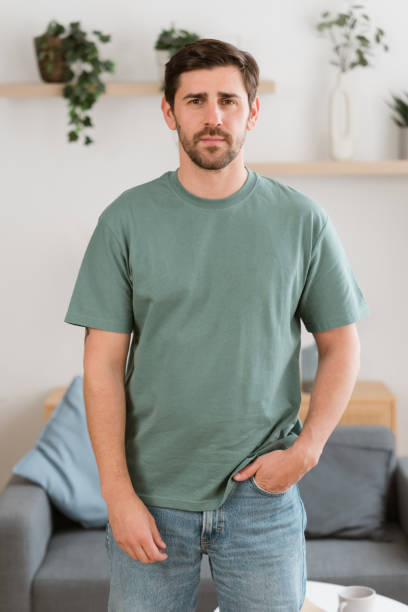 istock Confident man posing with hand in pocket at home 2161969895