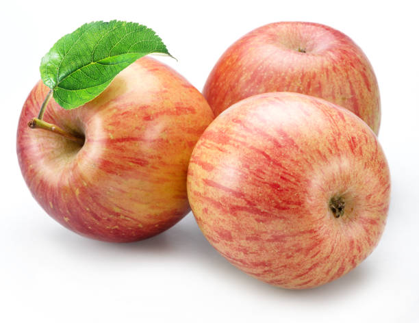 istock Striped delicious apples with apple leaf isolated on white background. 2161970212