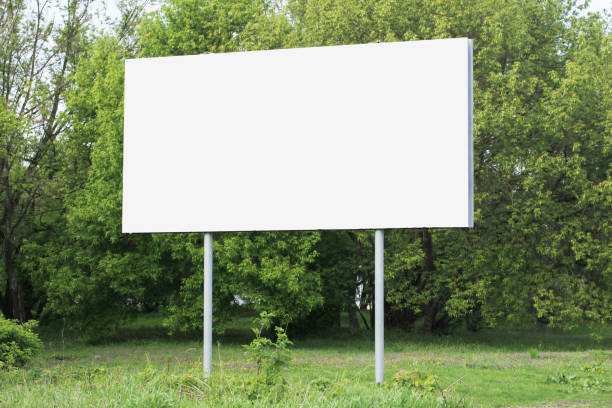 istock Blank billboard background. City park advertisment texture. Empty copy space poster signpost panel. . 2161971155