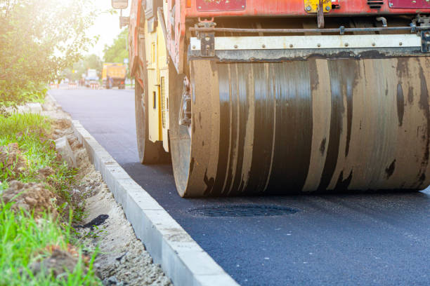 istock working people roll out new asphalt using special equipment on a hot summer day, arranging city streets and making life better for cars and drivers 2161971603
