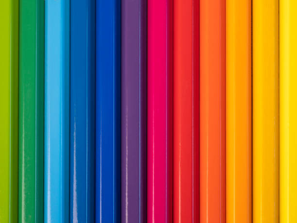 istock Arrangement of colored pencils in a row vertically. 2161972519