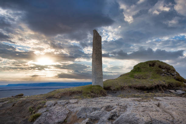 istock Sunset over historical stone monument on hilltop in Iceland 2161972728