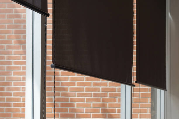 istock The window blinds are black and the brick wall is red 2161976062