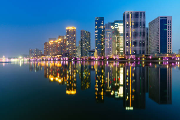istock Skyscrapers reflection upon Grand Canal in Beijing 2161976611