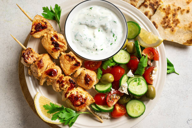 istock Grilled chicken kebab with vegetable salad 2161977805