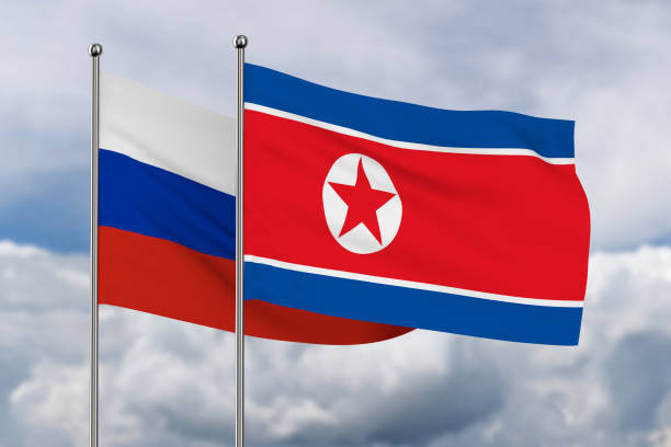 istock North Korea and Russian flag on sky background. 3D illustration 2161978799
