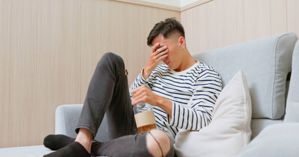 istock Asian man home alcohol addiction 2161980447