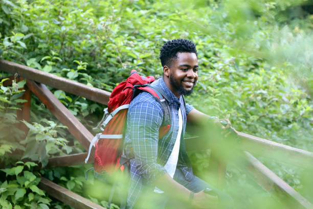 istock Young man hiking in nature 2161986247