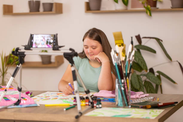 istock Down Syndrome Artist Vlogs Her Drawings 2161988286