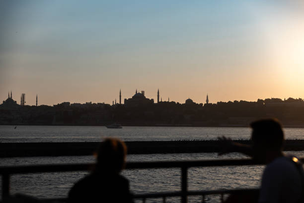 Istanbul cityscape from Bosphorus at sunset.