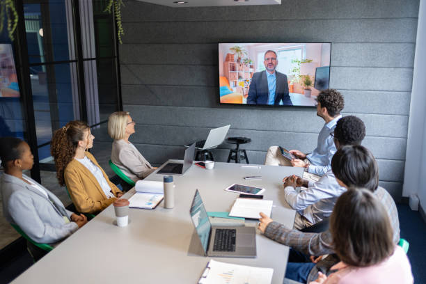 istock Colleagues communicate with the CEO by video conference 2161994011