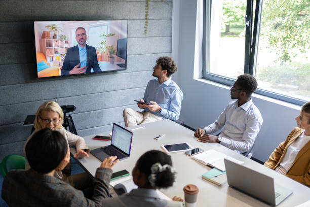 istock Discussion in the office, colleagues on a video conference with the CEO 2161994033