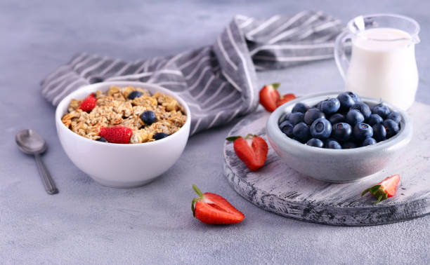 istock granola with berries for breakfast, healthy eating 2161994050