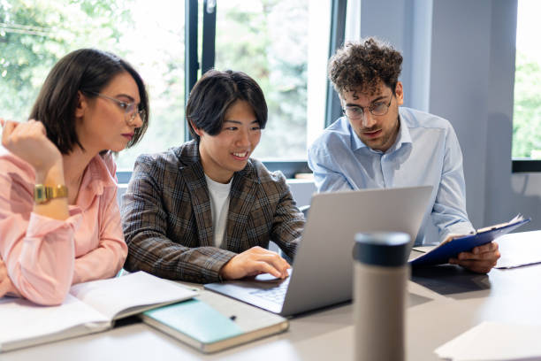 istock A young team of multicultural groups preparing a presentation in a modern office 2161994124