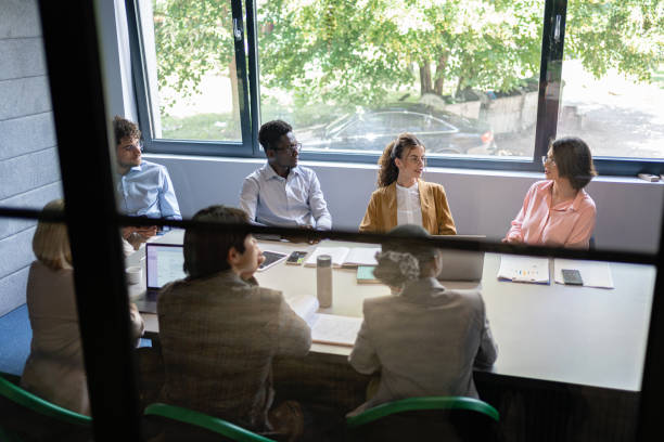 istock Colleagues share ideas for business improvement 2161994146