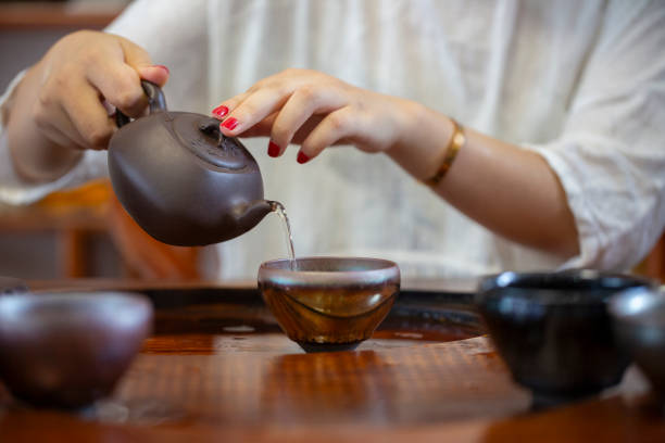 istock A woman is pouring tea 2161995965