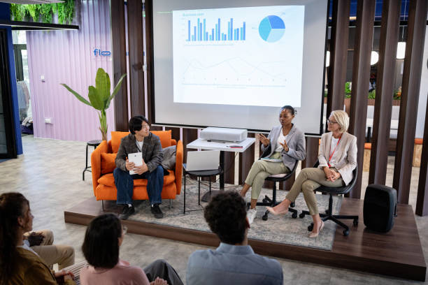 istock A group of colleagues carefully monitors the presentation and provides support 2161996086