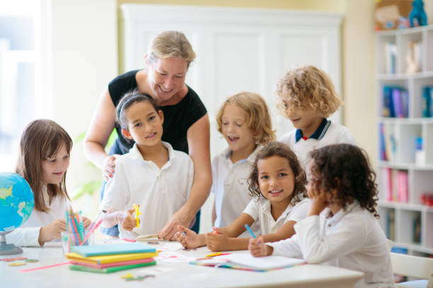 istock Kids back to school. Group of children. 2162000921