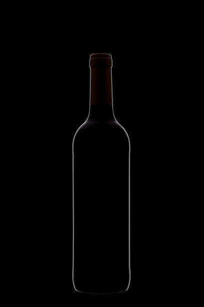 istock Bottle of wine with beautiful highlights on a black background 2162006171