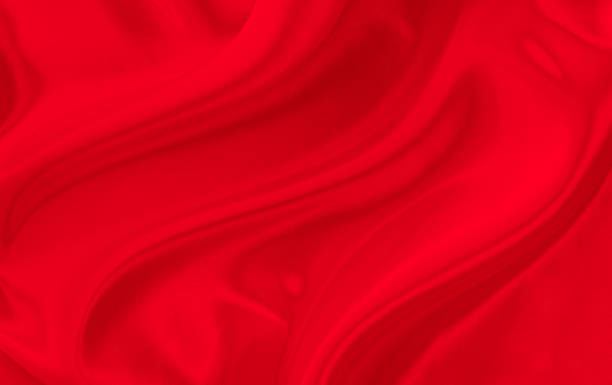 istock Black red satin dark fabric texture luxurious shiny that is abstract silk cloth background with patterns soft waves blur beautiful. 2162008525