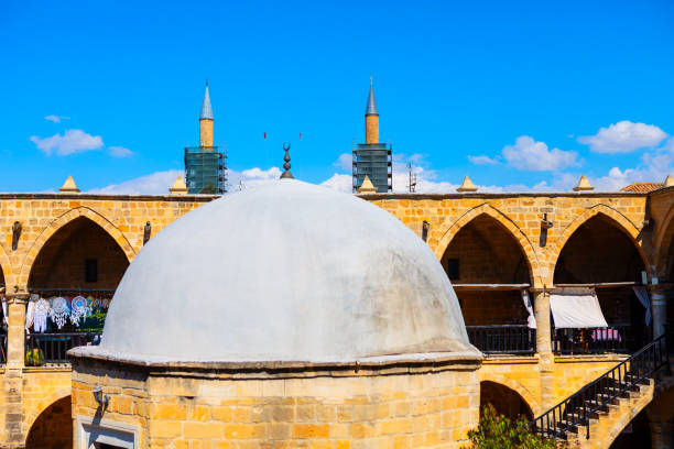 Buyuk Han Ottoman architecture in Cyprus. Architectural masterpiece with dome and twin towers, standing tall and majestic against the sky