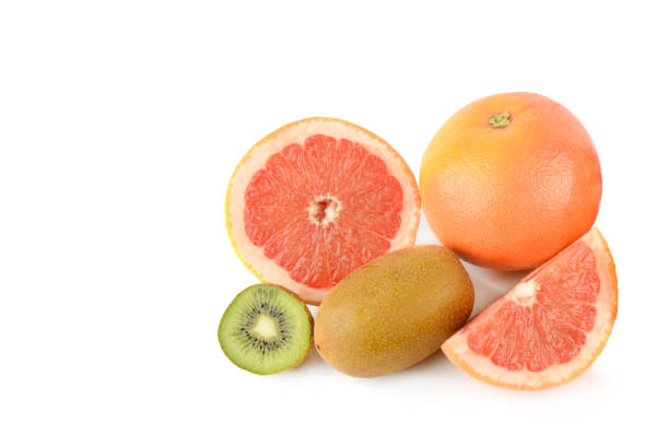 Kiwi and Grapefruit fruits isolated on white background. Free space for text.