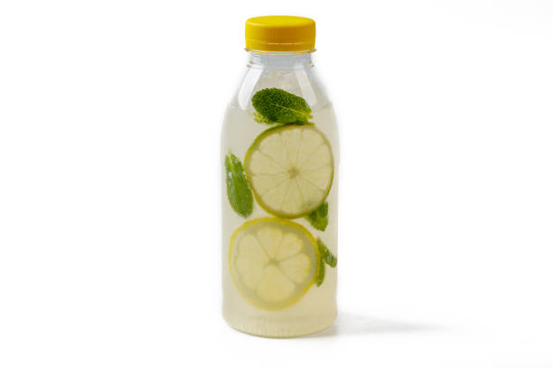 istock Summer refreshing drink lemonade with lemons,Mint leaves,Lime in a bottle 2162009596
