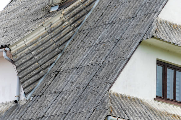 istock roof covered with grey asbestos tiles 2162012885