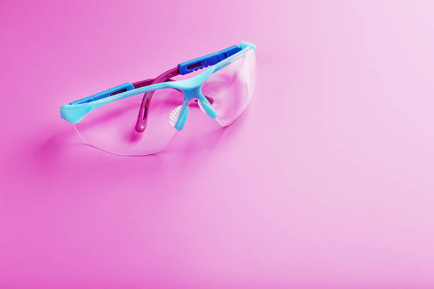 istock Protective open glasses isolated on a pink background. 2162013029