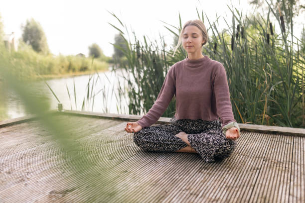 istock Yoga on lake 2162015479