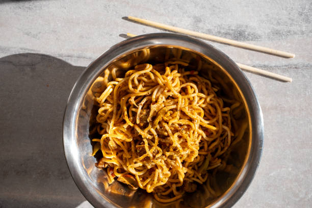 istock cooking instant noodle on metal plate 2162021051