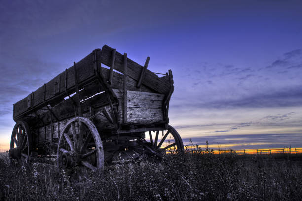 Rustic wooden horse carriage standing outdoors surrounded by natural landscape. Vintage rural transportation symbolizing history, tradition, countryside lifestyle, and nostalgia.
