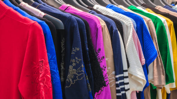 istock multicolor clothing in the store market 2162029199