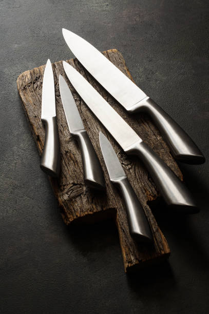 istock Casting steel various chef knife, Set of modern sharp kitchen knives on dark background 2162031758