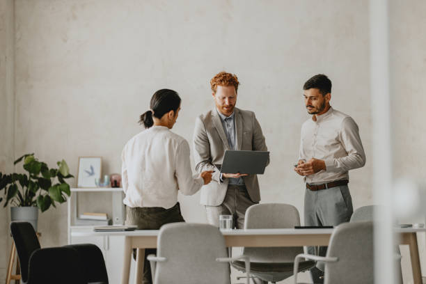 Group Business Meeting in Bright Beige Office Space