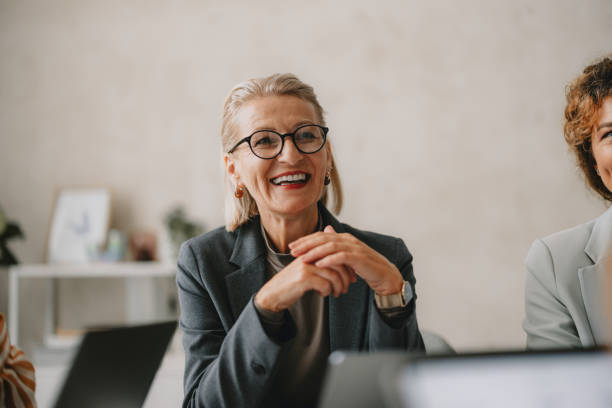 istock Happy Female Professional in Bright Beige Office 2162033419