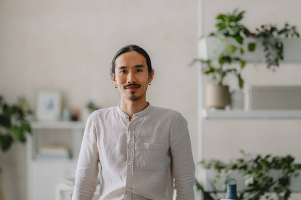 istock Portrait of Confident Businessman in Bright Office Setting 2162033449